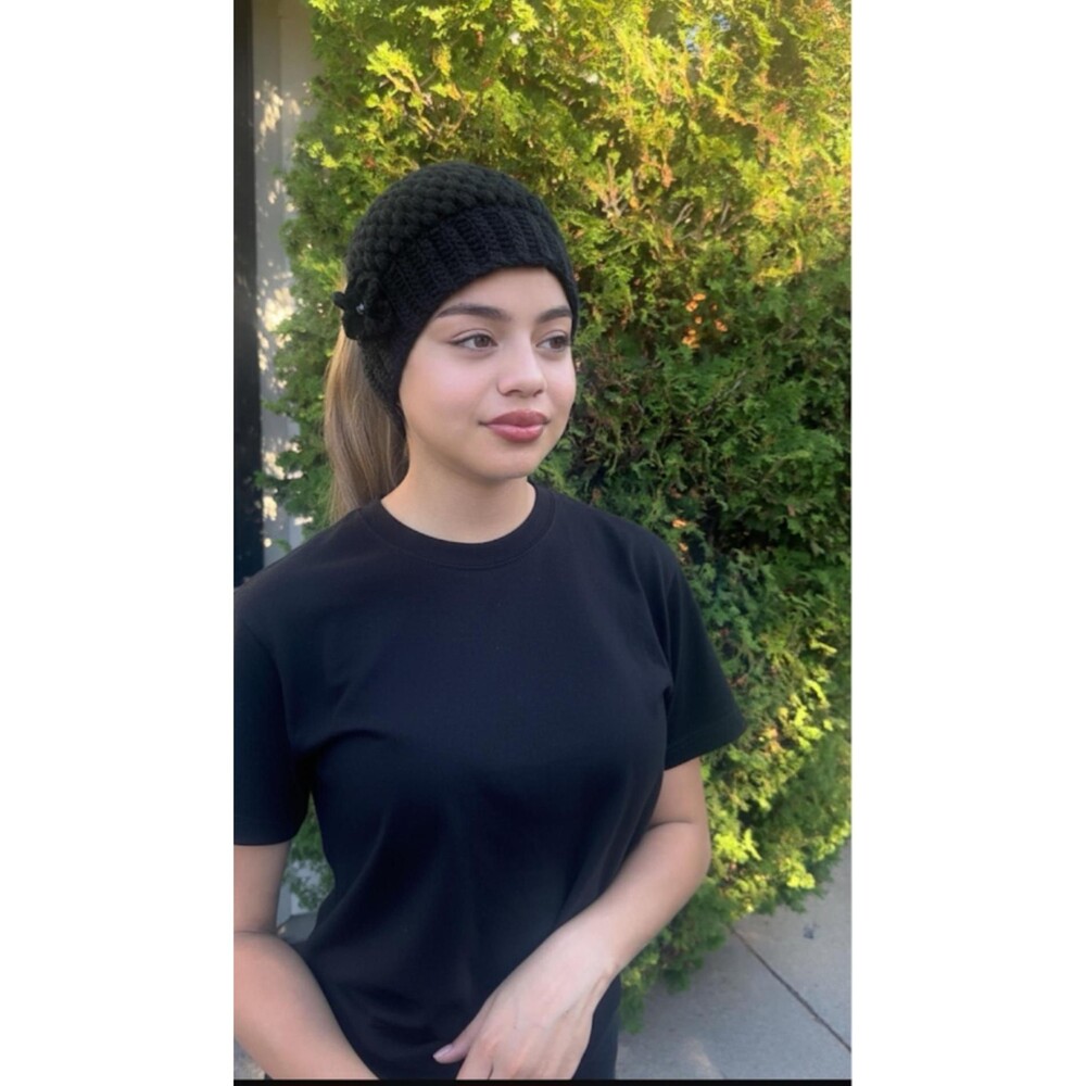 black crochet scrunchie hat with a beautiful flower